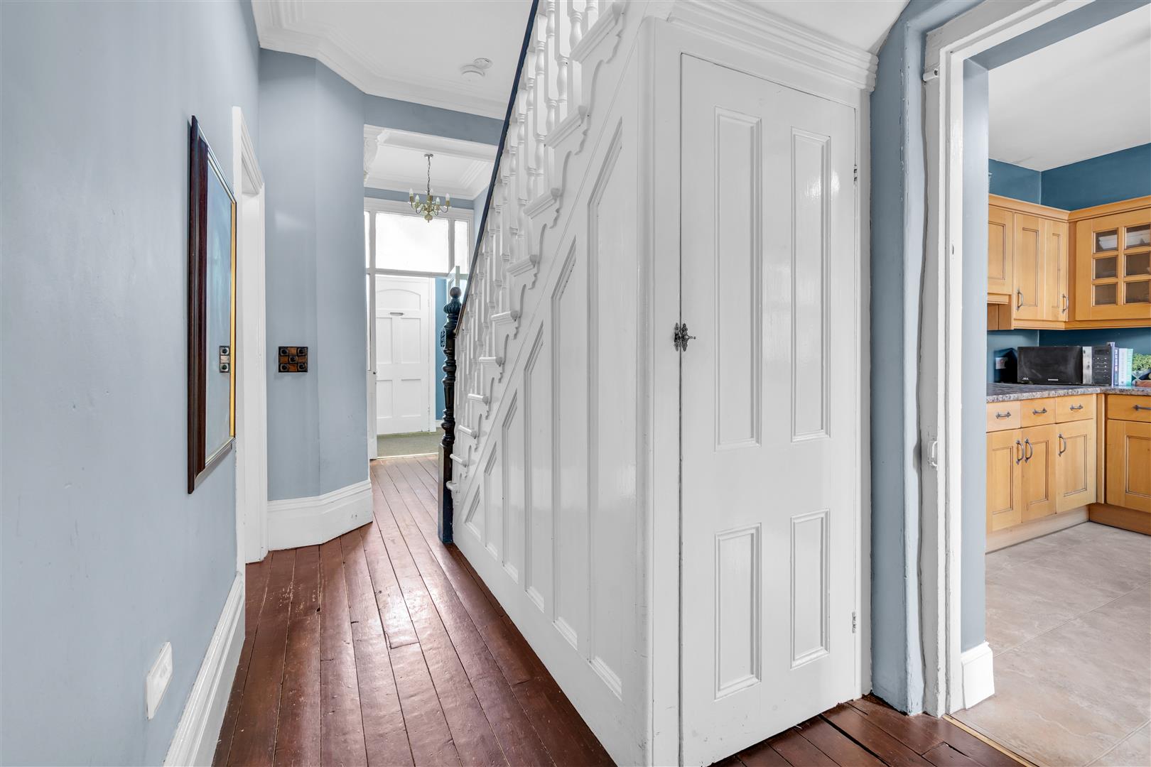 Hallway With View Of Kitchen